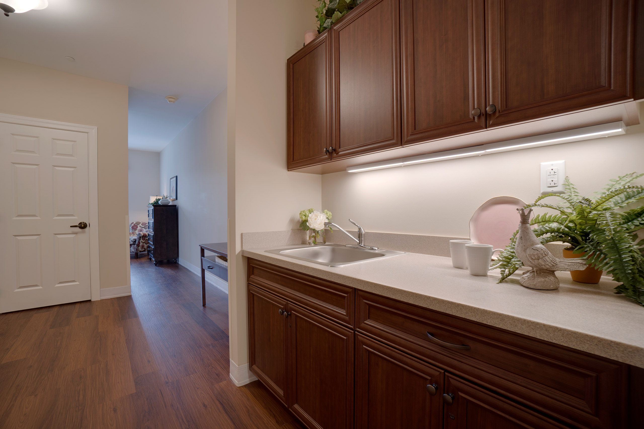 Assisted living apartments include small galley kitchen areas