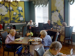 Residents enjoy lunch in the lovely dining room