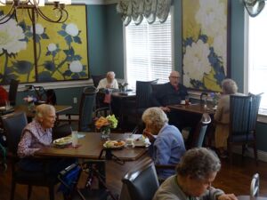 Residents enjoy lunch in the dining room